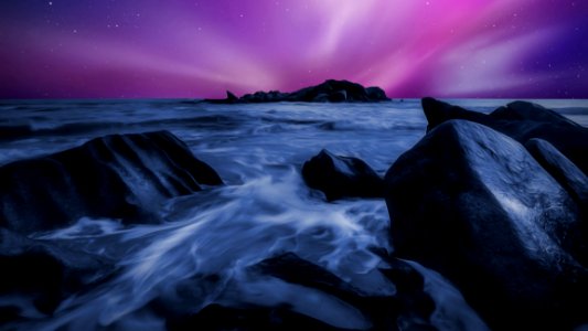Time Lapsed Photo Of Sea During Night Time photo