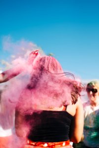 Woman Hair Covered With Pink Powder photo