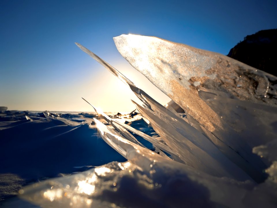 Closeup Photography Of Frozen Water On Sand