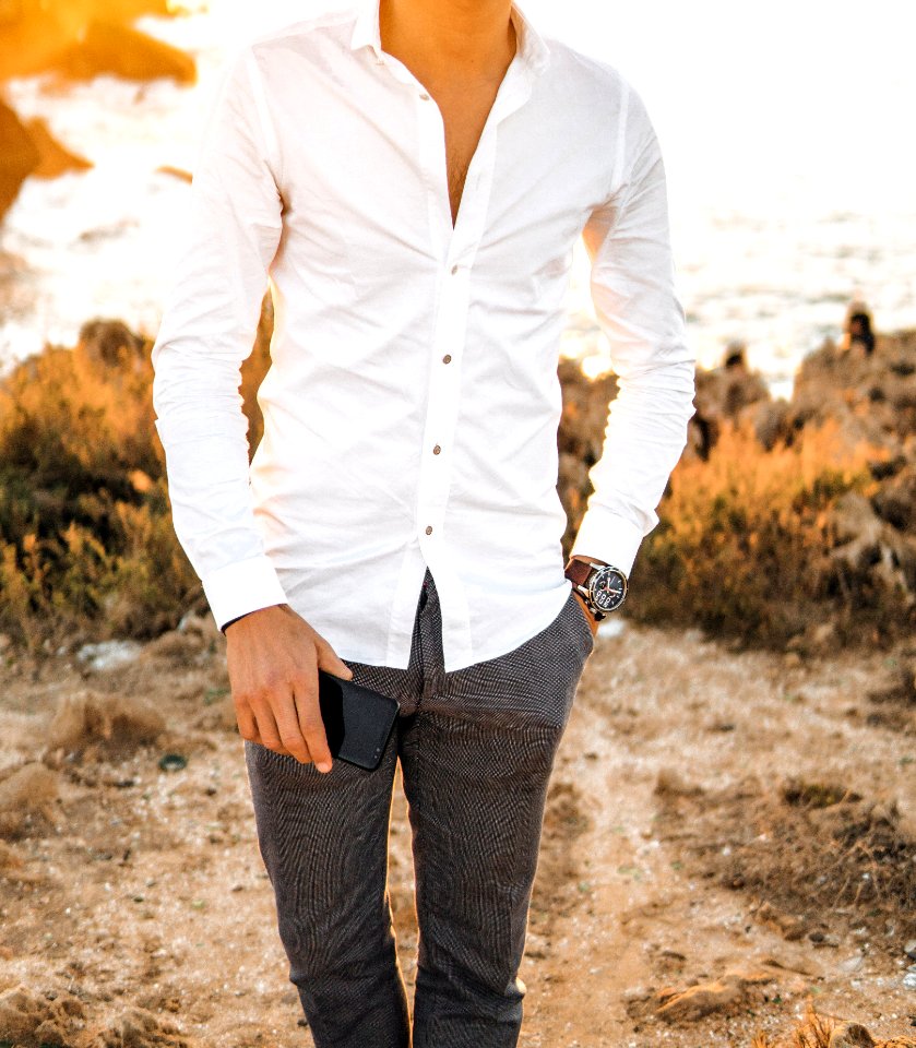 Man Wearing White Dress Shirt And Gray Bottoms