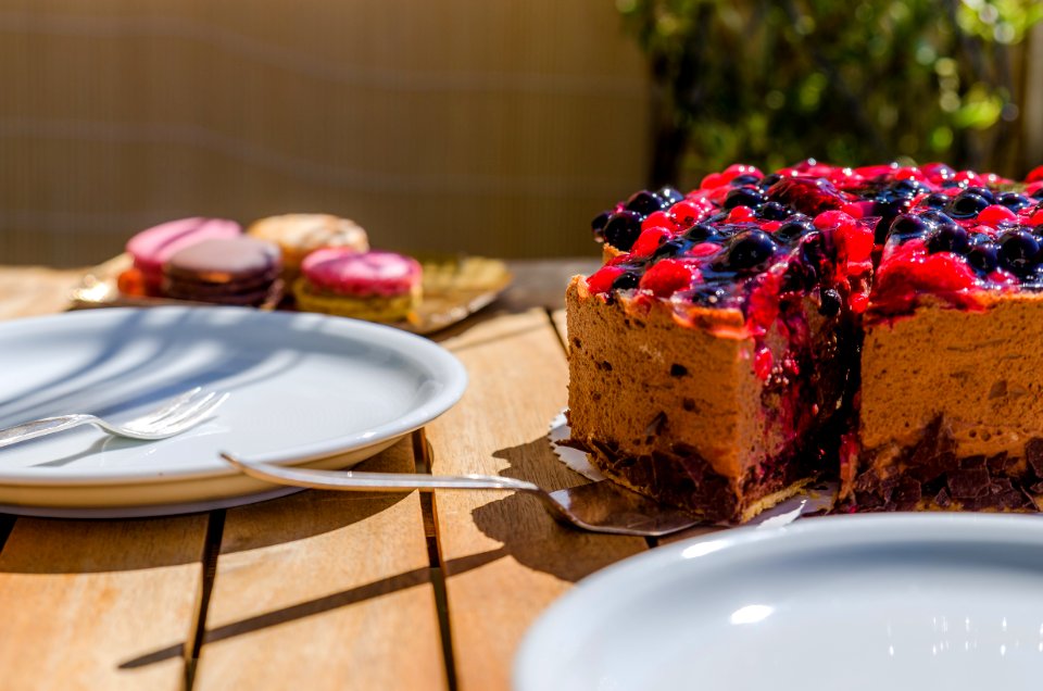 Cake Near White Ceramic Plate On Brown Wooden Table