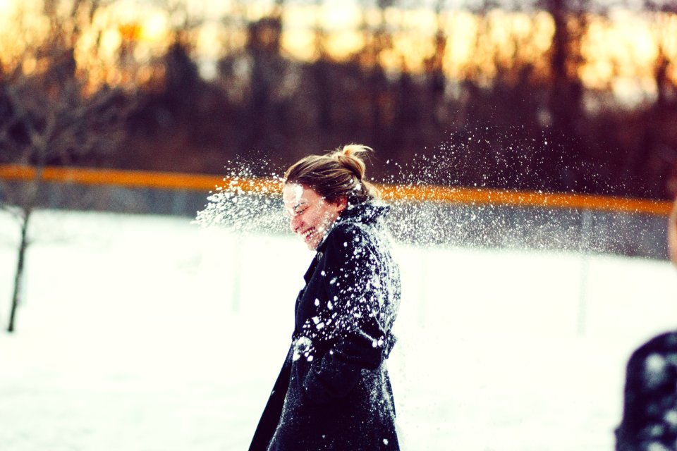 Woman In Black Coat Hit With Snowball On The Head