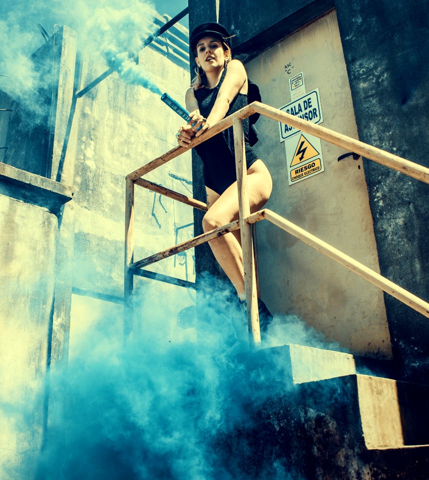 Woman In Black One Piece Swimsuit On Stairs