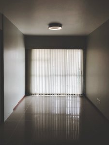 Empty Room With Closed Window Curtains