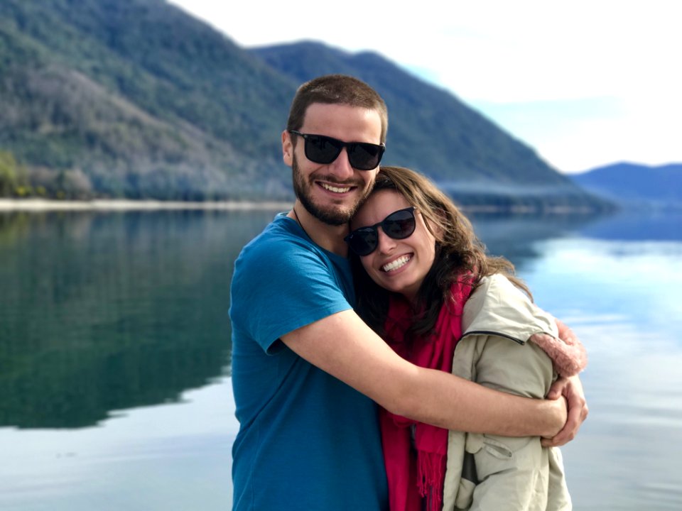 Hugging Couple Near The Body Of Water