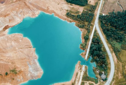 Aerial Photo Of Lake Near Highway photo