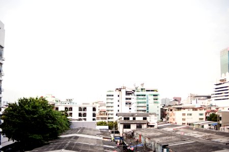 White And Blue Highrise Building At Daytime photo