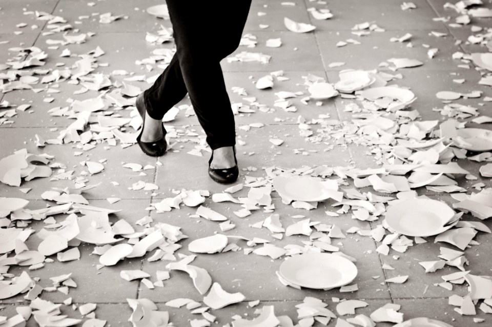 Grayscale Of Woman In Black Flat Sandals Walking