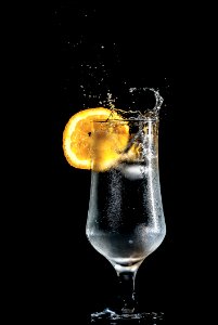 Full Wine Glass With Lemon Slices