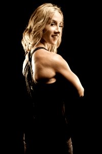 Woman In Black Halter Top While Smiling