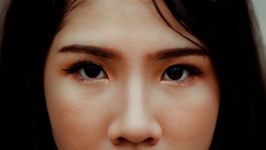 Close-Up Photography Of A Woman photo