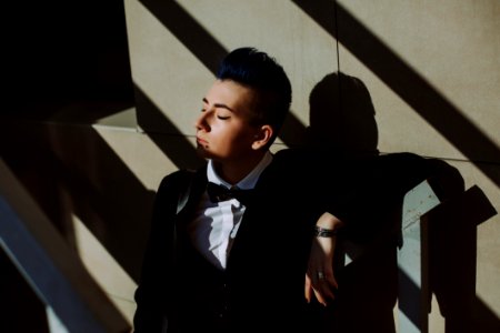 Man In Black Suit Jacket On Stairs photo