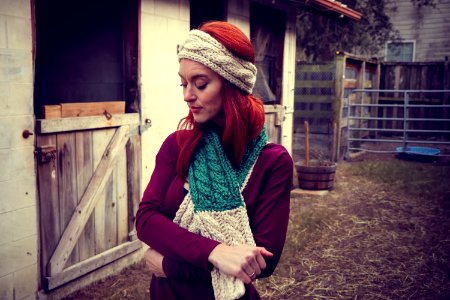 Woman In Purple Sweatshirt Wearing Knitted Beanie And Scarf