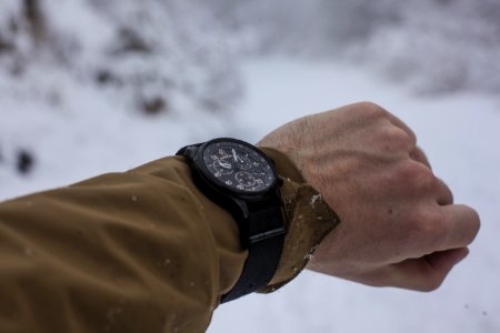 Person In Brown Long-sleeved Top Wearing Chronograph Watch photo