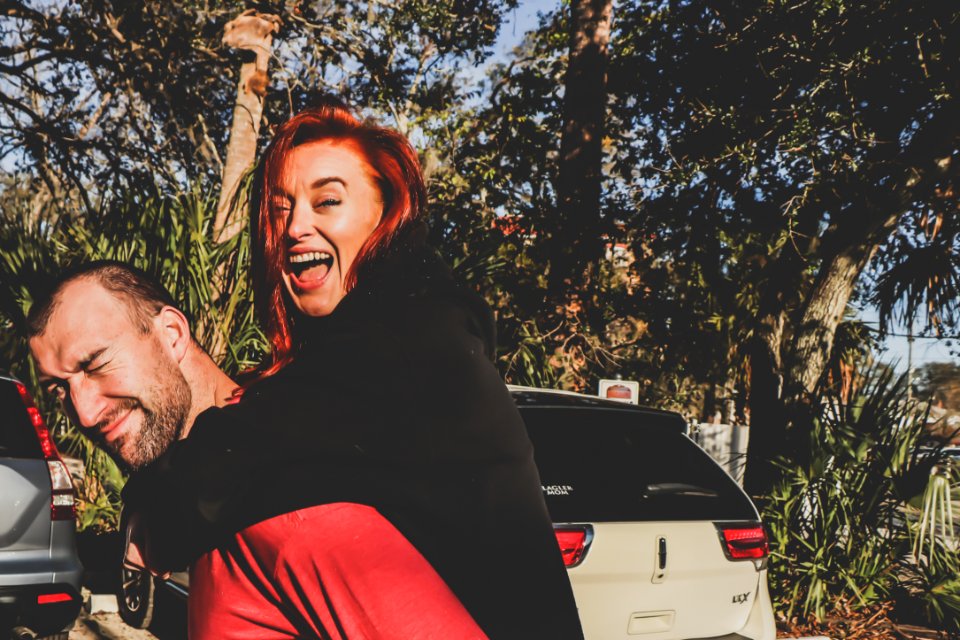 Woman Being Carried By Man Outdoor