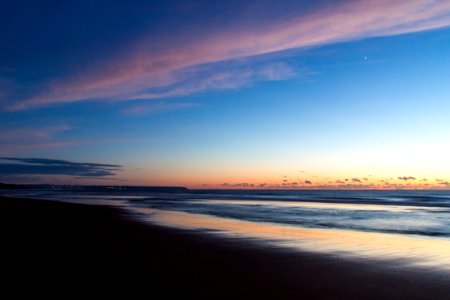 Time Lapse Photo Of Seashore During Golden Hour