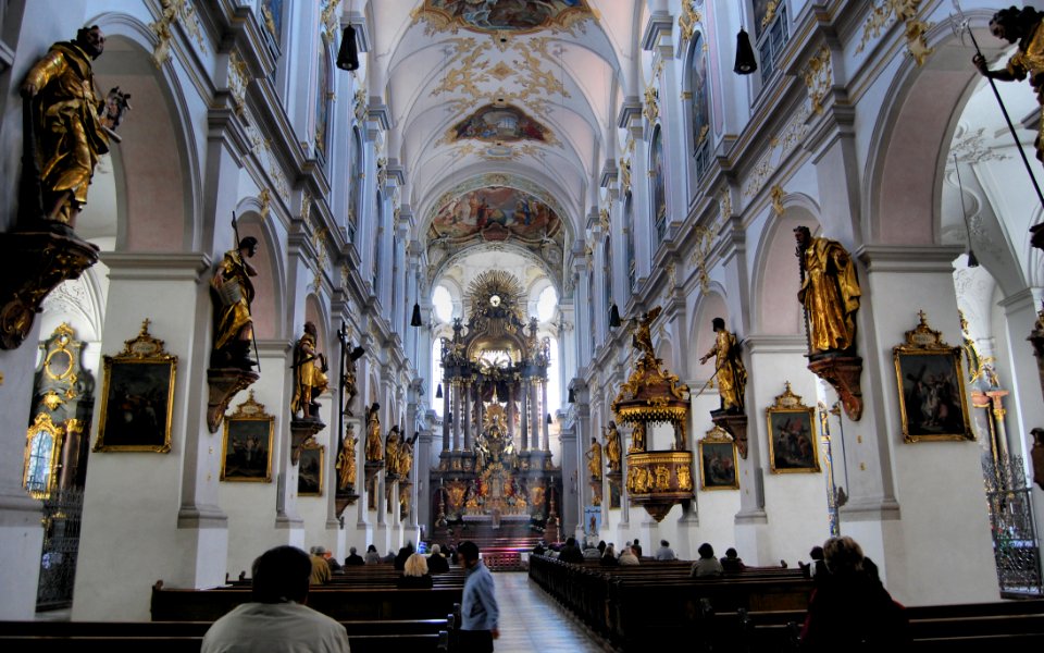 Group Of People Praying Inside Of The Church