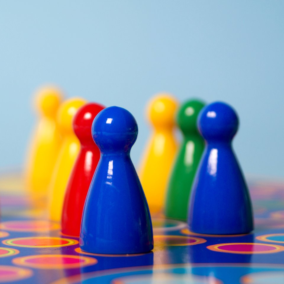 Closeup Photography Of Yellow Red Green And Blue Chess Piece