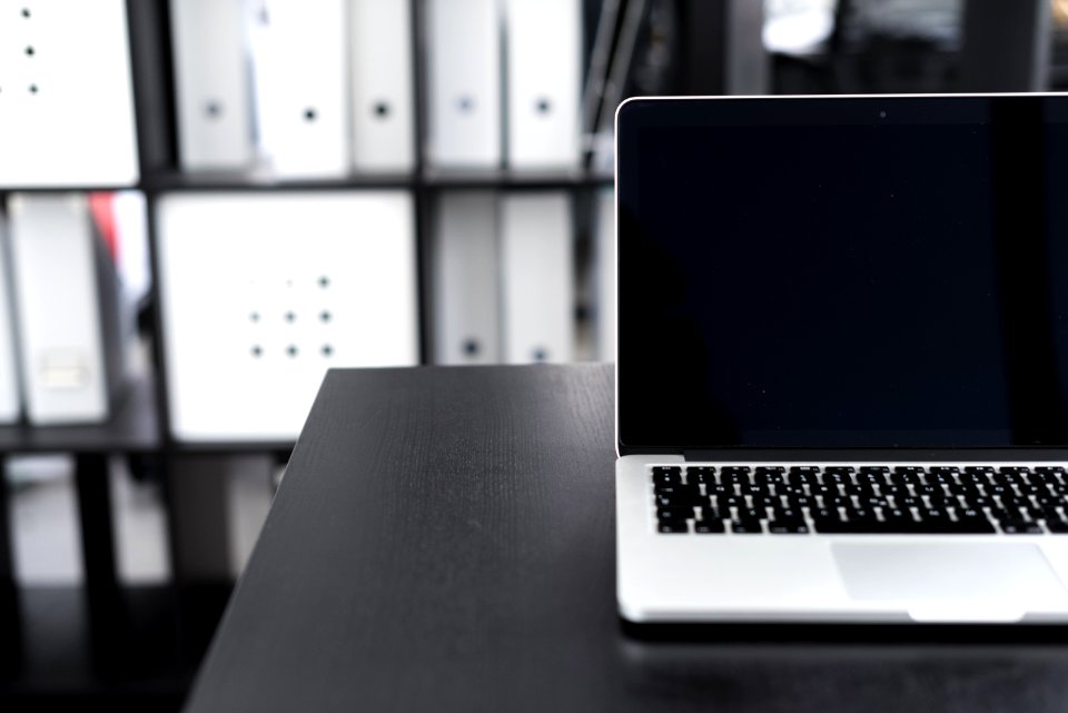 Close Up Photo Of A Silver Macbook photo