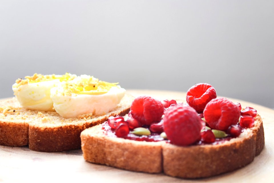 Two Boiled Egg And Raspberries On Loaf Bread