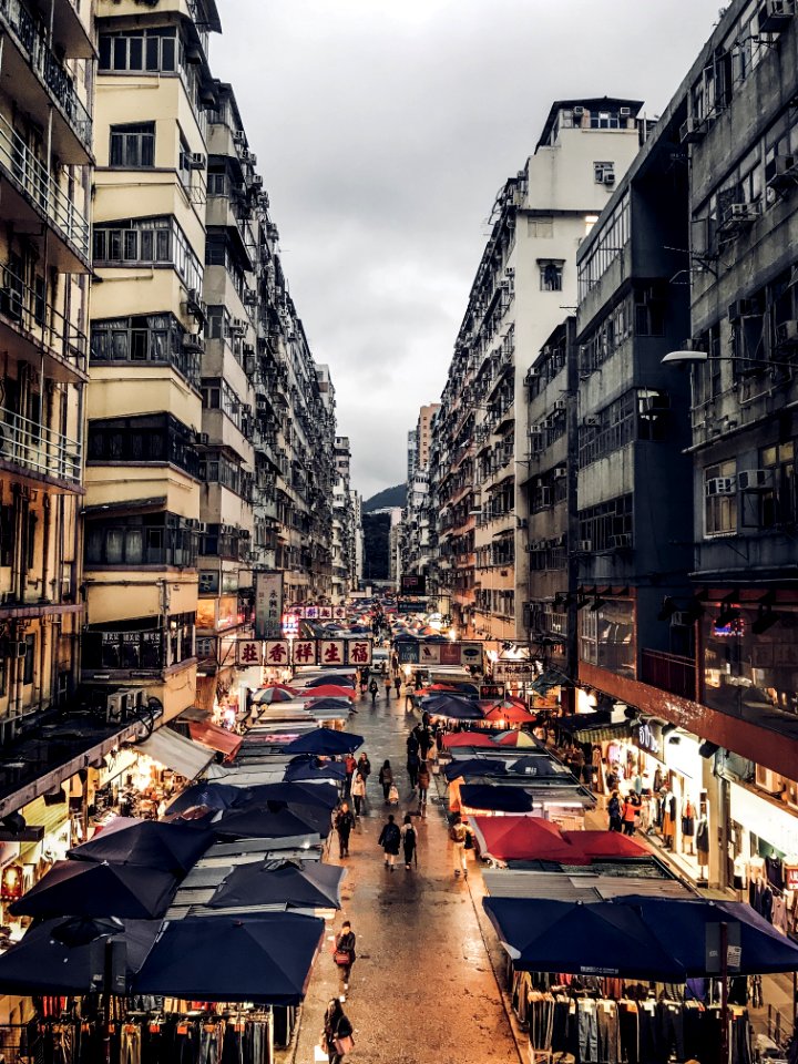 Photo Of A Pathway With Gray And Black Buildings photo