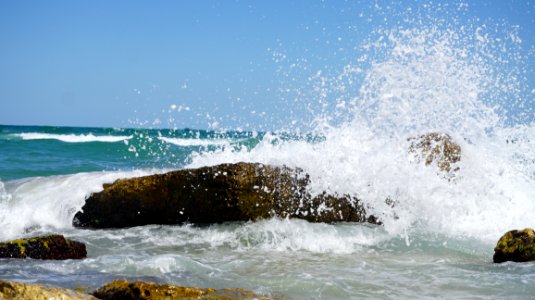 Photography Of Sea Waves Under Blue Sky photo