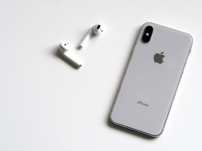 Silver Iphone X With Airpods photo