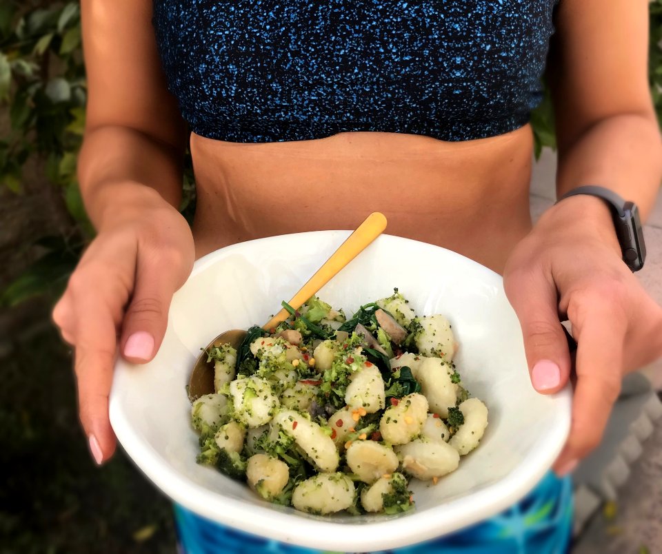 Person Holding Bowl With Mixed Food