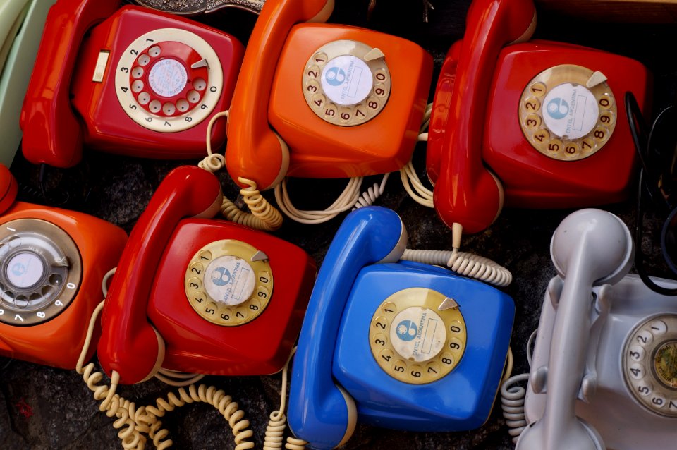 Seven Assorted Colored Rotary Telephones