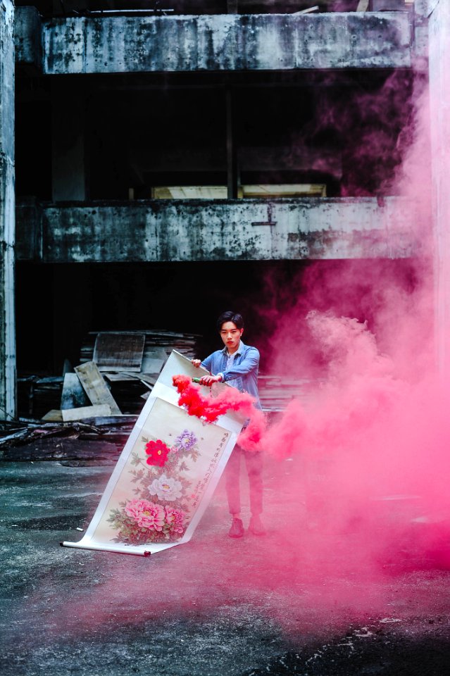 Person Holding Red Smoke Signal