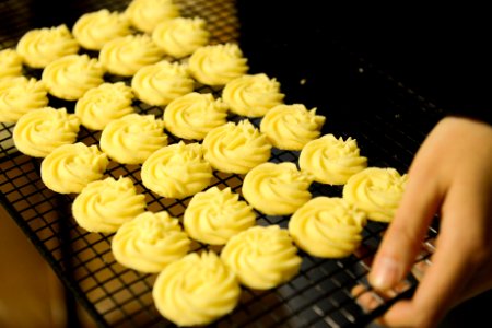 Person Holding Tray Of Cookies