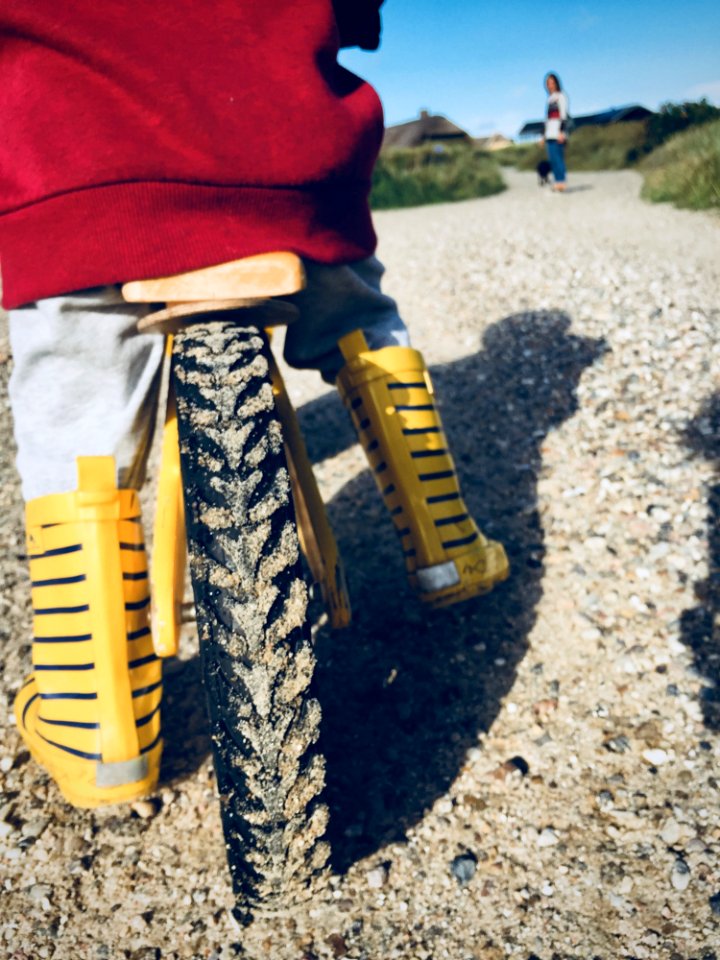 Yellow Bicycle On Brown Sand