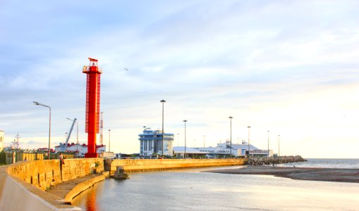 Photo Of Medium Rise Buildings Near Body Of Water photo