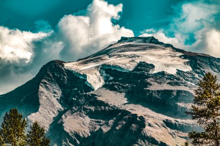 Rocky Mountain Under Blue Cloudy Sky photo