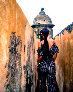 Woman Wearing Black And Gray Pinstripe Cold-shoulder Jumpsuit In Temple