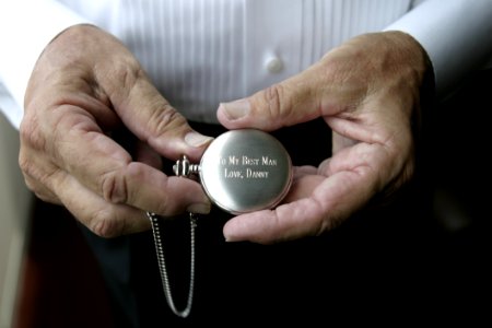 Person Holding Silver-colored Pocket Watch photo
