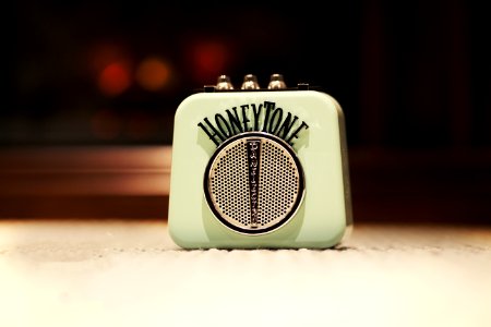 Selective Focus Photography Of Honey Tone Mini Amp photo