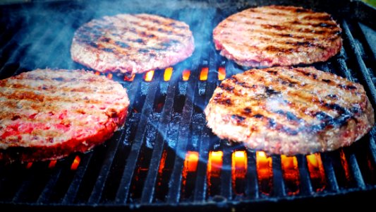 Shallow Focus Photo Of Patties On Grill photo