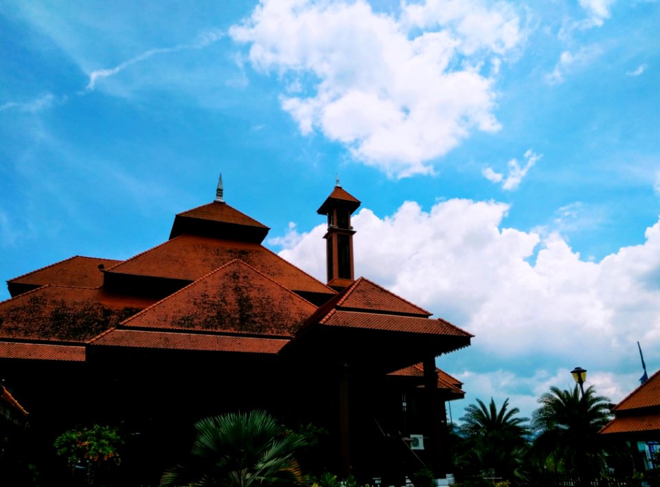 Low Angle Photography Of Brown Concrete Building