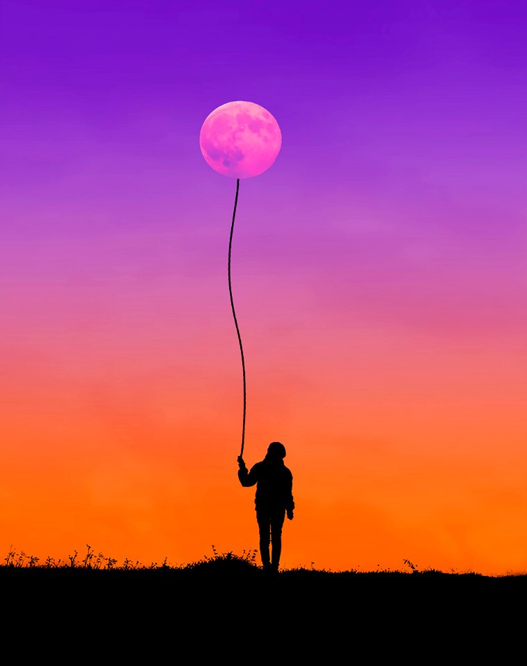 Silhouette Of Man Holding String Connected To Moon
