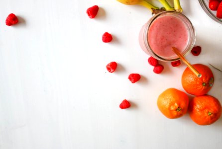 Orange Fruit And Raspberries