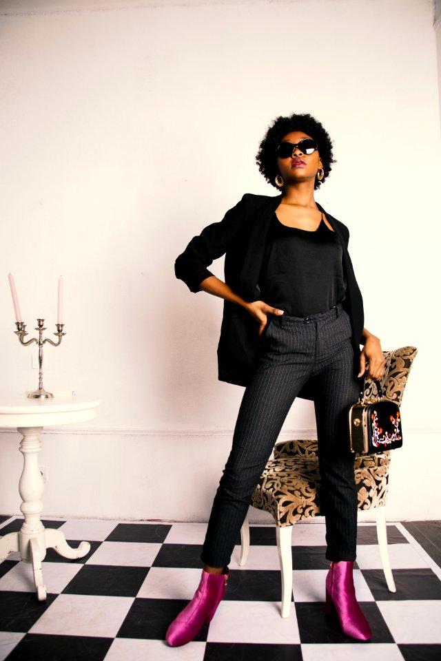 Woman In Black Blazer And Black Slacks With Purple Boots Photo