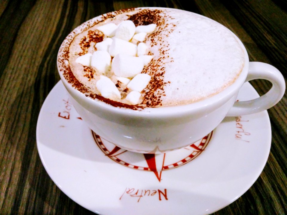 Photo Of White And Brown Frappe On Ceramic Tea Cup