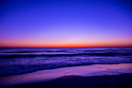 Scenic View Of Ocean During Dawn photo