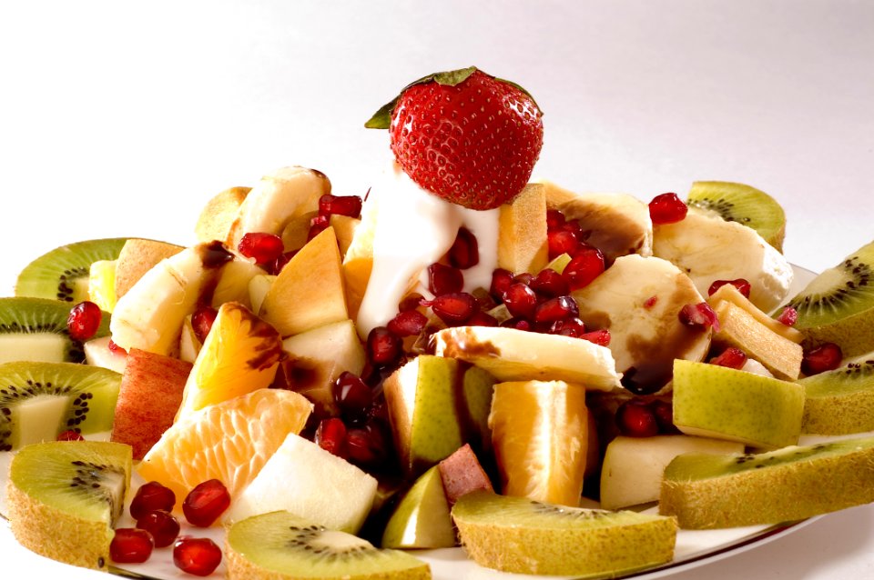 Strawberry With Sliced Kiwis And Fruits