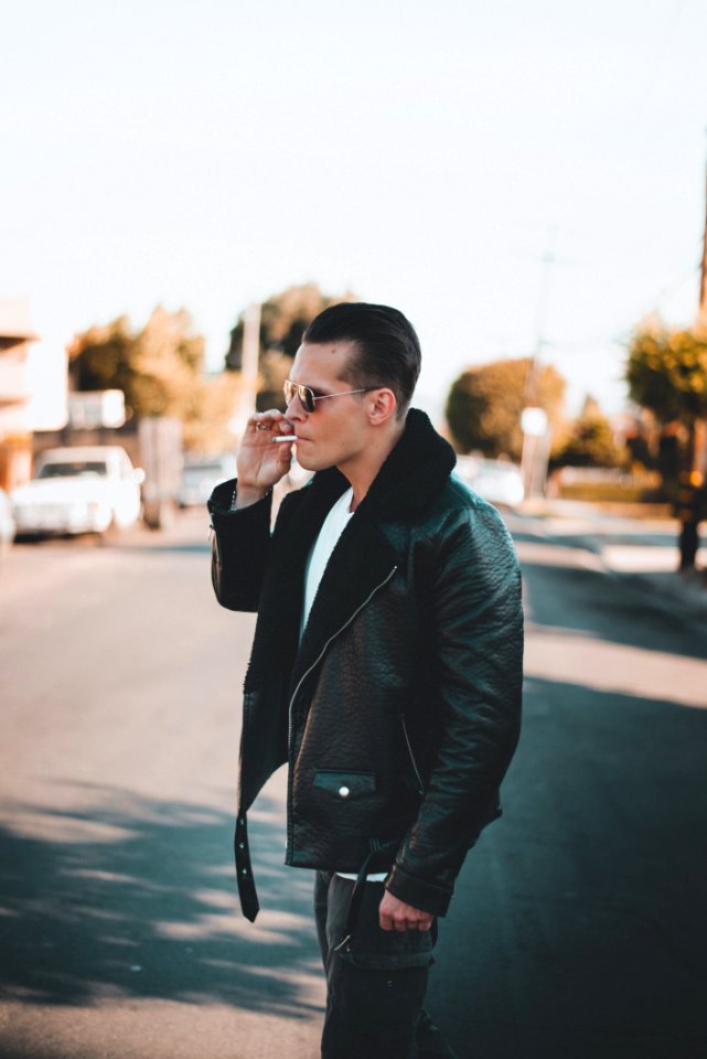 Man Wearing Black Leather Jacket