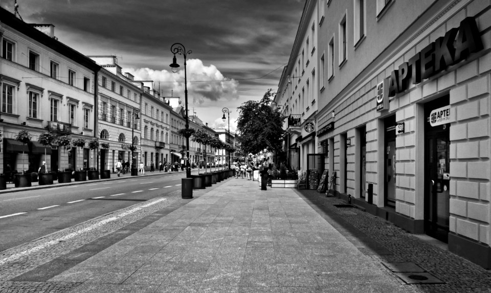 Greyscale Photo Of Road With Buildings photo