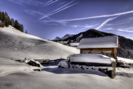 Brown Wooden House Covered With Snow photo