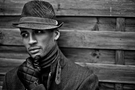 Man Wearing Black Hat And Gloves