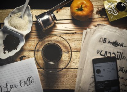 Drinking Glass On Brown Wooden Table photo